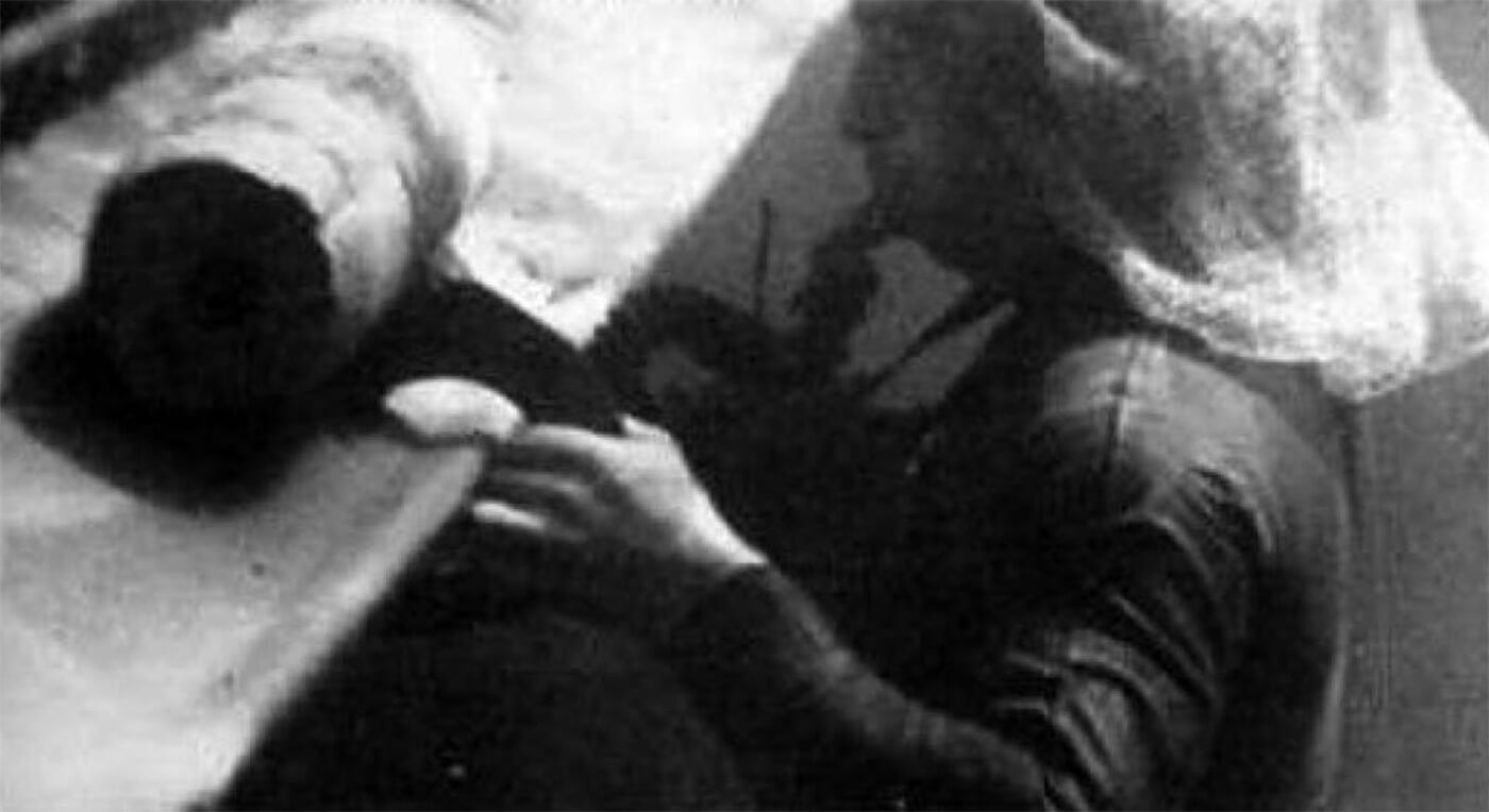 Frogman practising attaching a Limpet Mine.