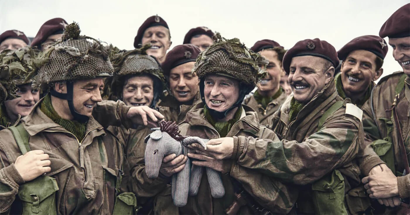 Paratroops of 22 Independent Parachute Company, British 6th Airborne Division, with their toy mascot 'Pegasus' at RAF Harwell, June 5th, 1944.