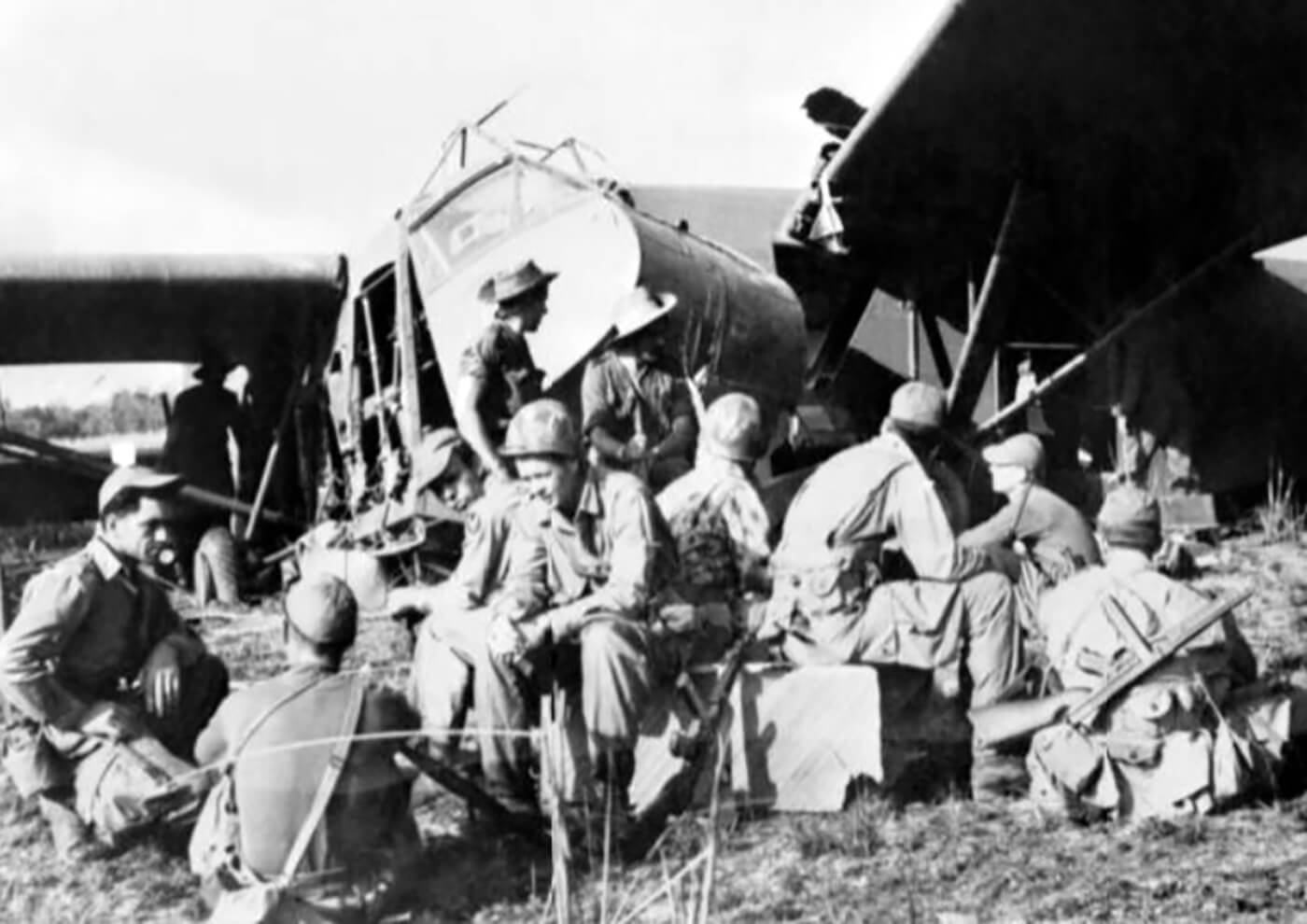 Operation 'Thursday' - March 1944: One of the gliders after landing at an airstrip code-named 'Broadway'. The men are waiting for daylight to begin work on the airstrip.(IWM)