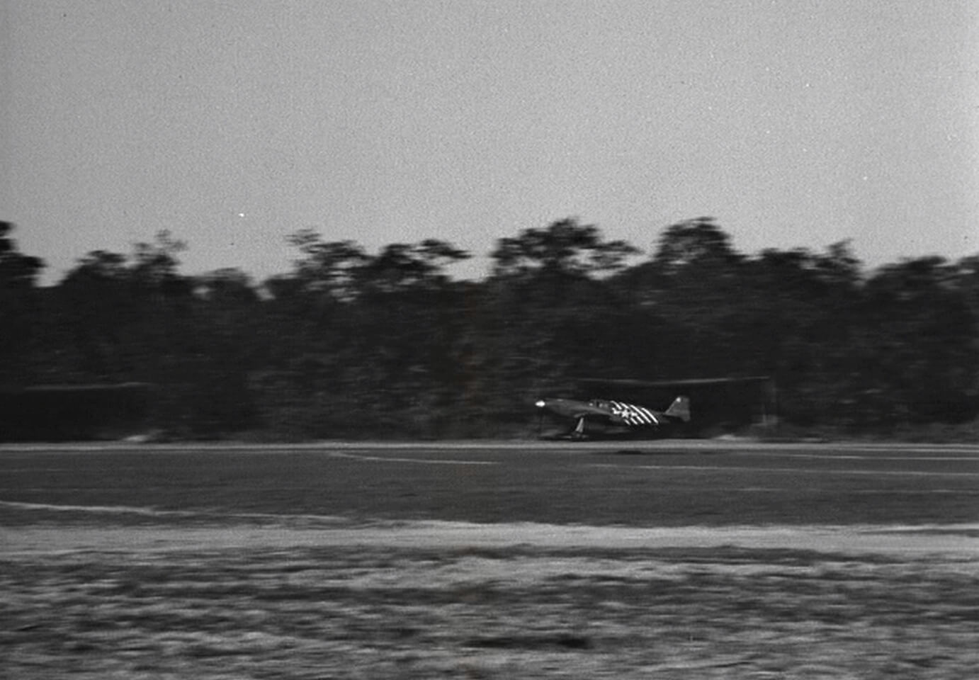 1st Air Commando Group P-51A Mustang landing at Tamu airstrip on February 15th, 1944.