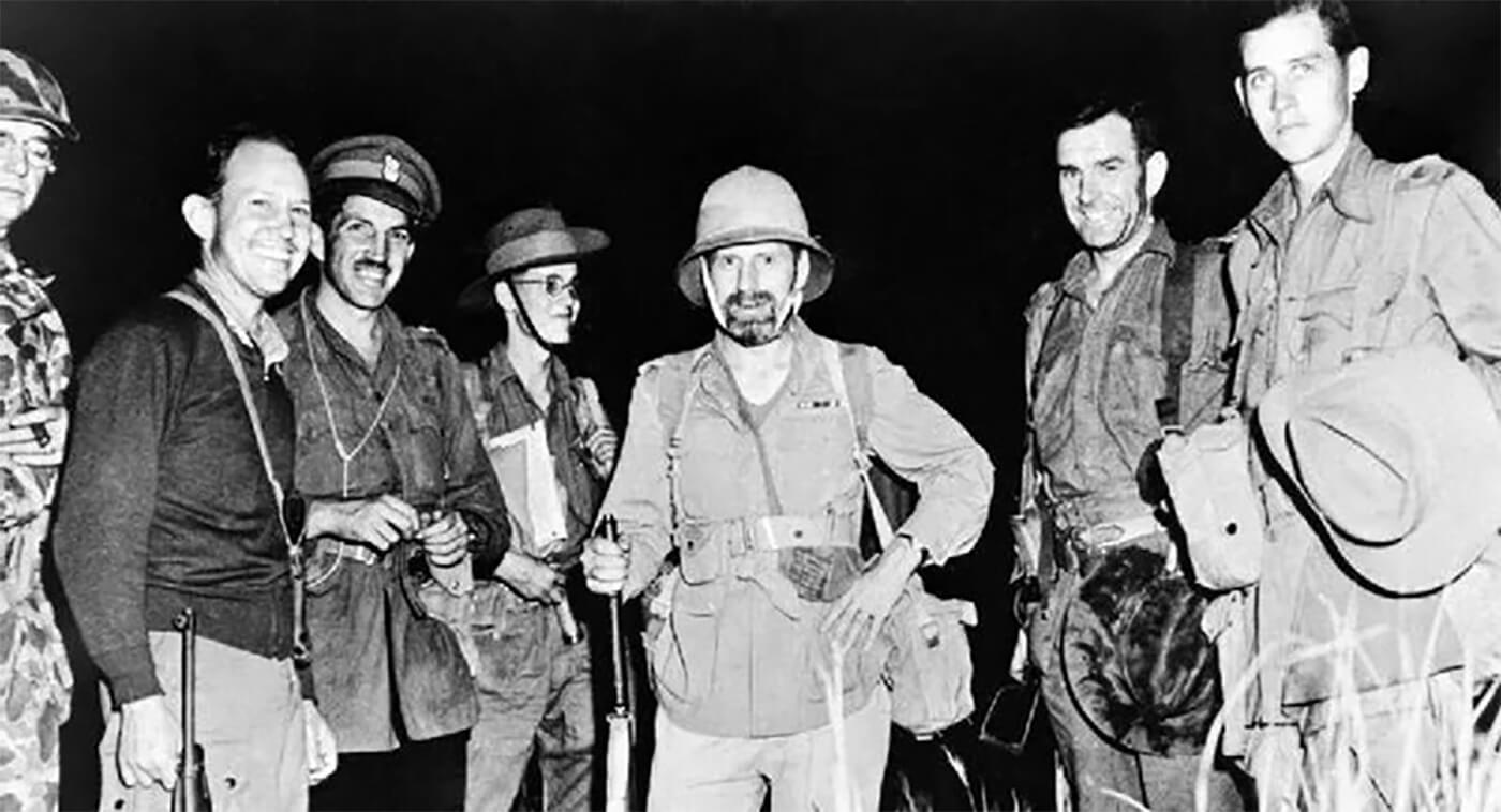 THE CHINDITS Chindit Operations - General Orde Wingate (center) with Chindit leaders at the airfield code-named “Broadway” in Burma awaiting a night supply drop, 1944. L-R: Captain Patrick Casey, Colonel J.R. Alison, Brigadier J.M. Calvert, Captain Borrow (Wingate’s ADC), General O.C. Wingate Lieutenant. Colonel W. Scott, Major Francis Stewart. Copyright: © IWM. Original Source: