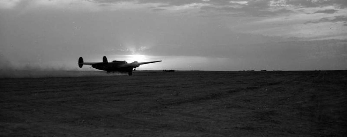 An Armstrong Whitworth Albemarle Mark I of No. 296 Squadron RAF takes of in the evening light from Goubrine II, Tunisia, during the airborne landings on Sicily; possibly carrying a team from No. 2 Special Air Service on Operation Chestnut, (12 July 1943).