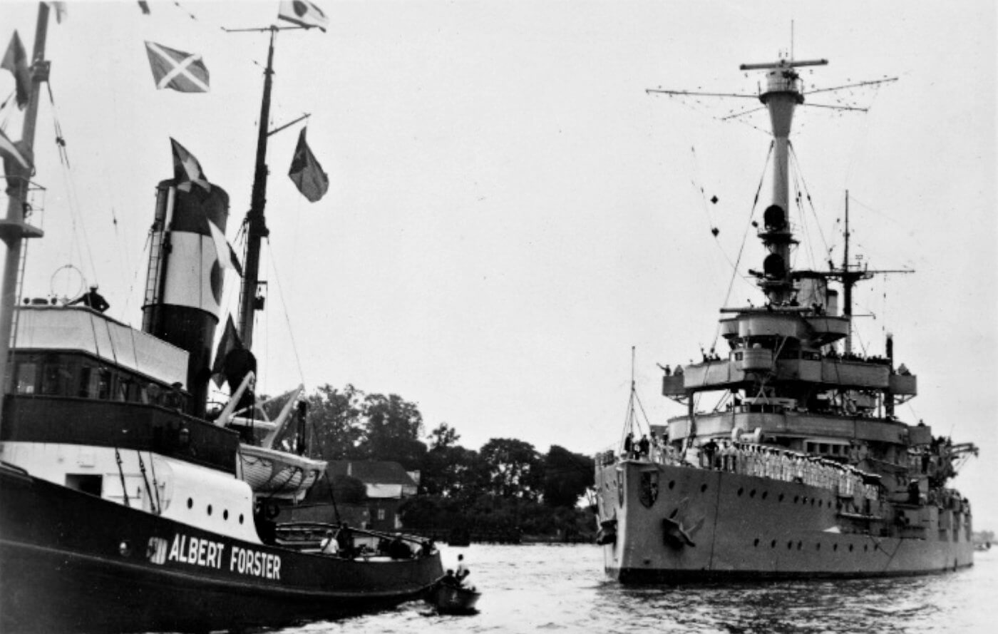 Battleship "Schleswig-Holstein" was brought into the city's harbor by the high seas tugs "Albert Forster" and "Danzig".