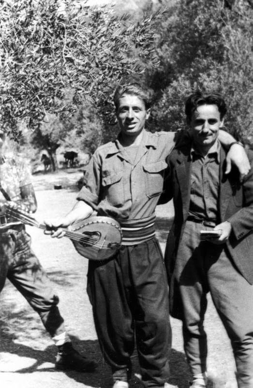 SERVICE OF MAJOR DAVID SMILEY WITH SPECIAL OPERATIONS EXECUTIVE (SOE) IN ALBANIA, 1943 -    1944. (HU 64880) Second mission: the two interpreters Halit Kola (holding stringed instrument) and Sheqir Trimi at Mukaj, August 1944. Copyright: ý IWM. Original Source: http://www.iwm.org.uk/collections/item/object/205061082