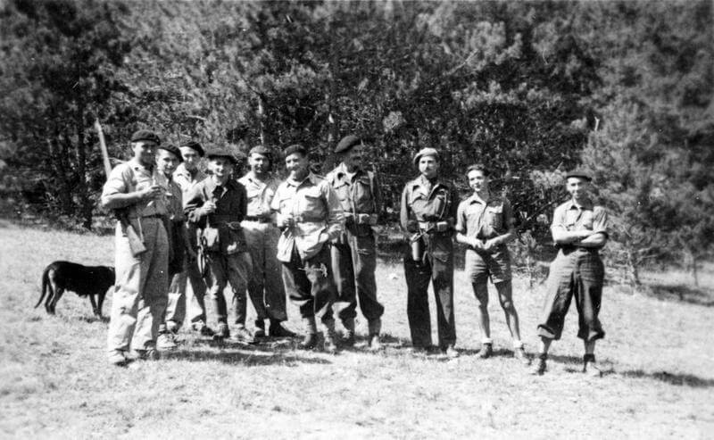 THE FRENCH RESISTANCE IN THE HAUTES-ALPES, FRANCE, AUGUST 1944. (HU 57107) Group of Maquis known as ?'The Poachers'? near Savournon, Hautes-Alpes, August 1944. Standing third and fourth from left are Captains John Roper and Robert Purvis of SOE (Special Operations Executive). Copyright: ý IWM. Original Source: http://www.iwm.org.uk/collections/item/object/205060952