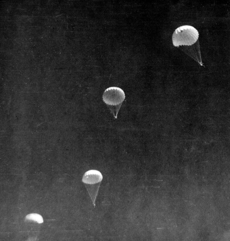 SERVICE OF DAVID SMILEY WITH MO4 (MIDDLE EAST BRANCH OF SPECIAL OPERATIONS EXECUTIVE -    SOE), FEBRUARY - MARCH 1943. (HU 68722) Parachute training at No 4 Middle East Training School, Kabrit: a stick of four    parachutes photographed by David Smiley on the way down, March 1943. Copyright: ý IWM. Original Source: http://www.iwm.org.uk/collections/item/object/205061709