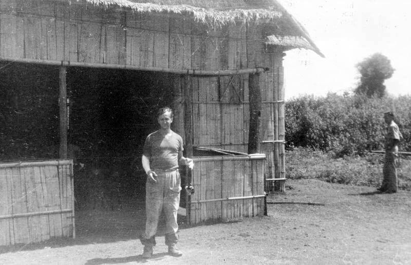 SERVICE OF COLONEL DAVID SMILEY WITH FORCE 136 (SPECIAL OPERATIONS EXECUTIVE [SOE]) IN    THAILAND (SIAM), MARCH - DECEMBER 1945. (HU 65764) David Smiley standing outside the officer's mess at the camp near Naarn clandestine    airstrip, June 1945. Copyright: ý IWM. Original Source: http://www.iwm.org.uk/collections/item/object/205061602