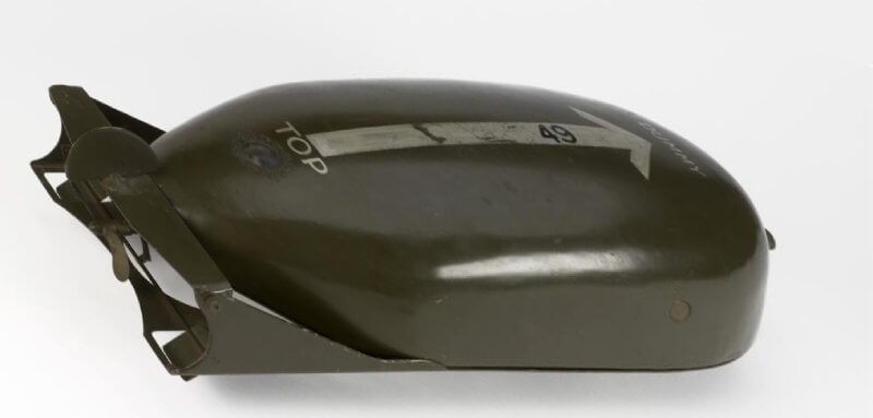 Welmine' motorised floating charge (MUN 216) floating charge
green painted boat shaped charge with propellor & rudder Copyright: ý IWM. Original Source: http://www.iwm.org.uk/collections/item/object/30019893