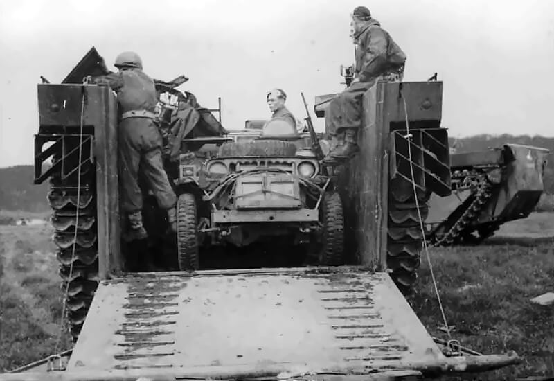 An SAS jeep sits secured inside a Buffalo amphibious landing craft, waiting to be ferried across the River Elbe during the final phase of the Allied advance into northern Germany in April 1945.
