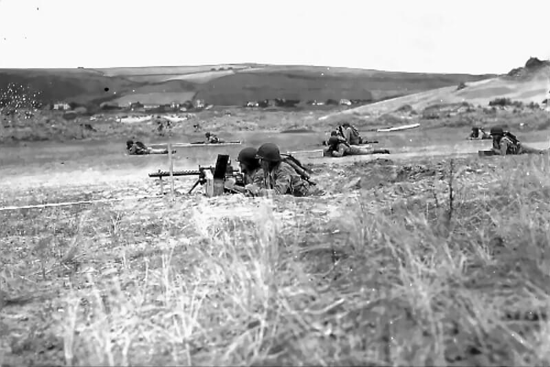 .30 calibre machine gun and sniper live-fire practice underway.