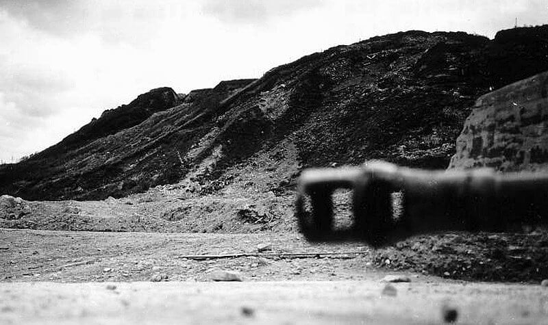 Shortly after D-Day: View from Widerstandsnest 72 towards the plateau and neighbouring Widerstandsnest 71 above Vierville-sur-Mer, Omaha Beach.
