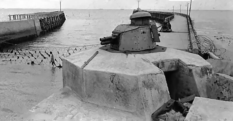 Renault tank turrets at the Harbour entrance of Grandchamp-les-Bains.