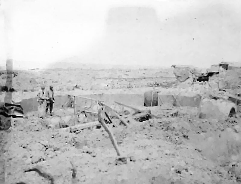 One Pointe du Hoc mock gun position, covered in debris, identified as unoccupied on US Intelligence planning maps before D-Day.