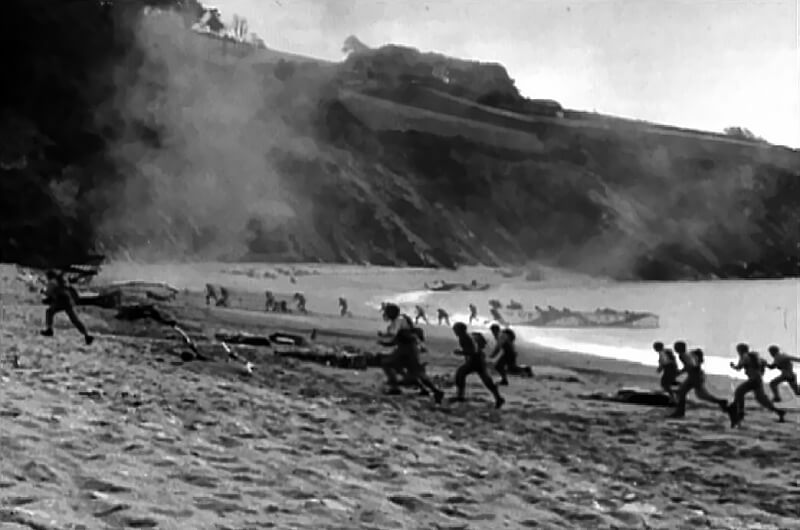 US troops conducting an assault exercise at Blackpool Sands, a smaller beach within the requisitioned area also used for training.
