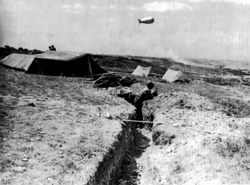 June 1944. German defensive trench at Widerstandsnest 60 overlooking Omaha Beach, part of the coastal fortifications captured by U.S. forces on D-Day.