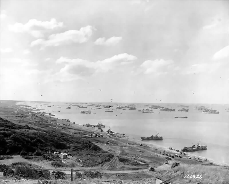 June 10, 1944. View from Widerstandsnest 60 at the eastern end of Omaha Beach, showing the shoreline cleared after days of heavy fighting.
