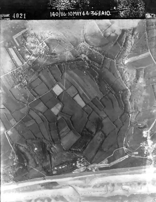 May 10th, 1944. Reconnaissance photo of WN 60, used by 20th Engineer Battalion, 5th Special Engineer Brigade to assess defences near the eastern end of Omaha Beach.