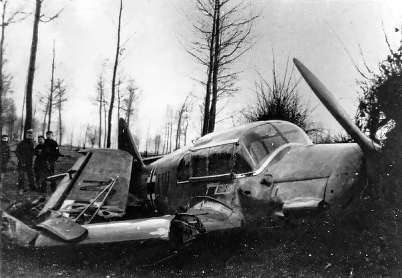 Wreckage of a Messerschmitt Bf 108, crashed and heavily damaged near the village of Vucht, Maasmechelen, Belgium.