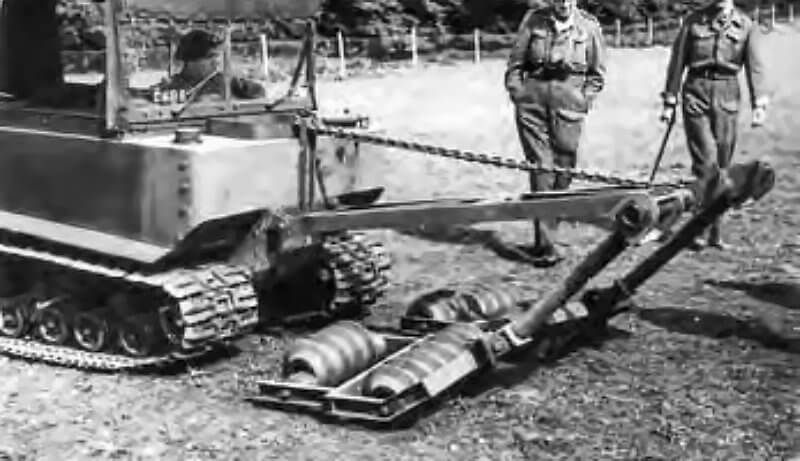 Rodent test vehicle shows a standard M29 fitted with Centipede mine-clearing rollers pushed ahead to detonate anti-personnel mines.