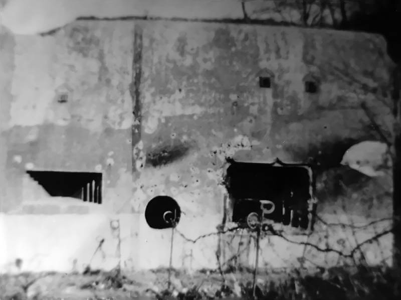 Fort Eben-Emael proves impervious to German machine-gun and cannon fire, the limited effects of which are visible on the outer walls of the fort.