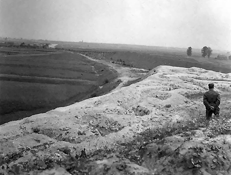 View of the Veldwezelt Bridge from the Kip van Hees, the elevated position where Belgian troops hold firm and successfully ward off the German attack.