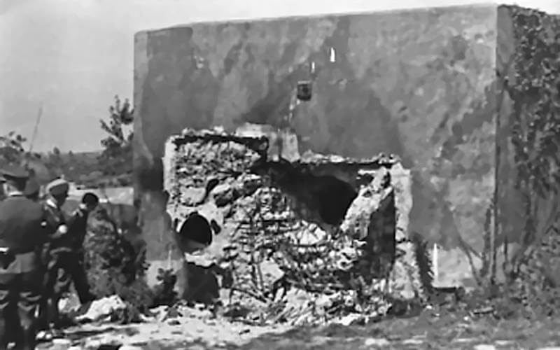 Luftwaffe personnel examine one of Fort Eben-Emael’s casemates, destroyed by a hollow charge carried and employed by the Fallschirmjäger.