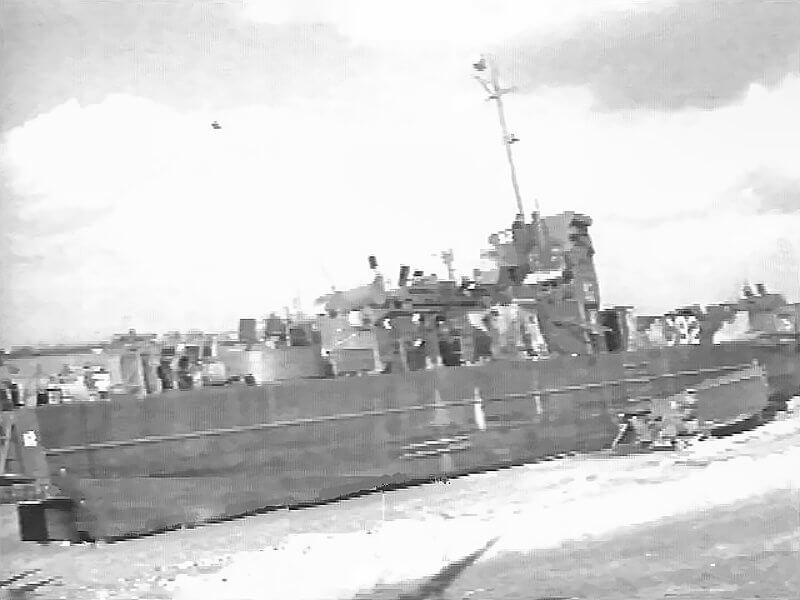 LCI,(L) 92 stranded on the beach of Normandy.