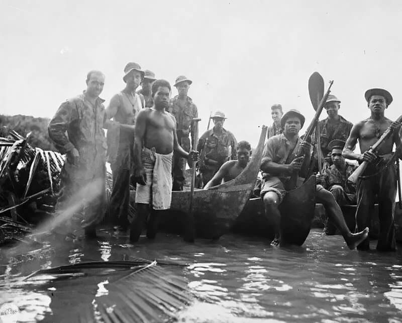 July 7th, 1943, New Georgia Group, Solomon Islands. New Zealand Sergeant Kennard, far left, with his group of Fijian commandos and native scout.
