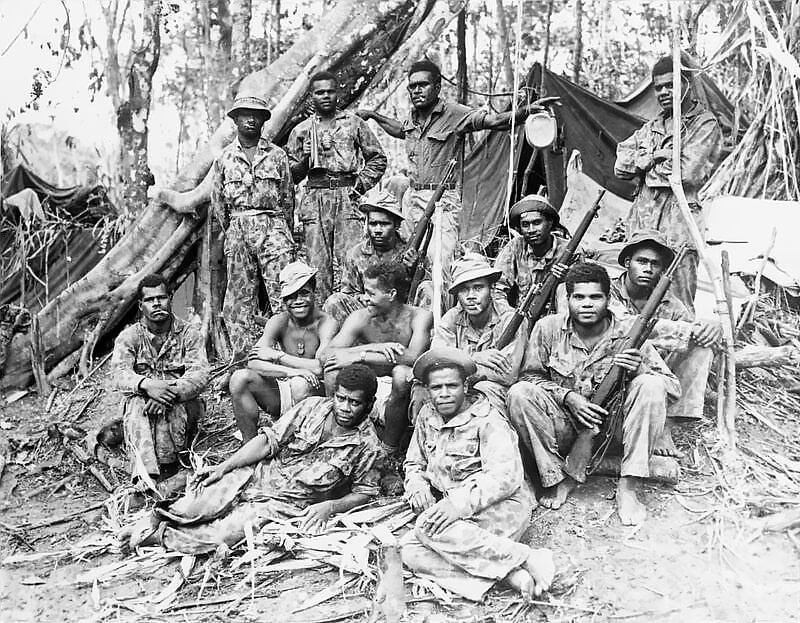 1943, New Georgia, Solomon Islands. Fijian commandos of the 1st Commando Fiji Guerrillas, the nucleus and main strength of the South Pacific Scouts. Fijians served alongside the U.S. 37th Infantry Division during the battle for Munda Airfield, many renewing friendships formed during the Division's ten-month stay on Viti Levu.