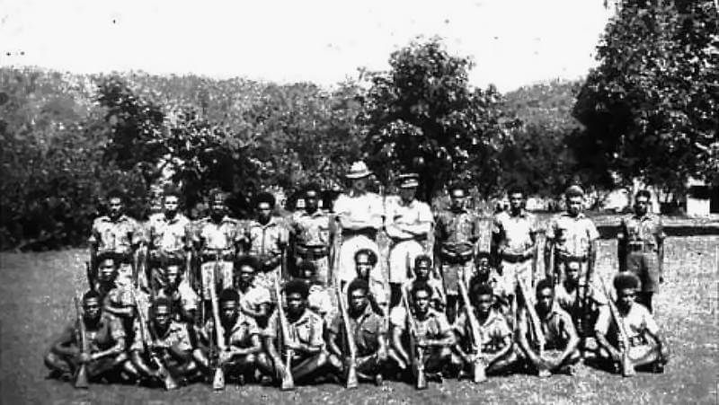 1943, Solomon Islands. Len Barrow and Ken Crass with their patrol of Solomon Islanders.